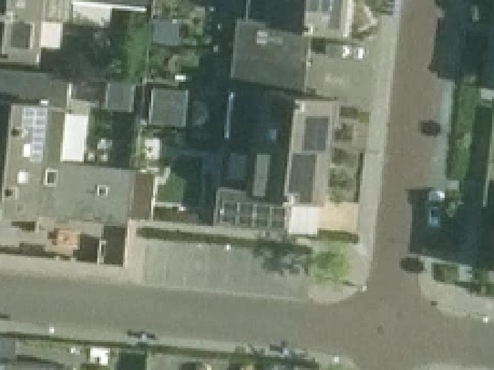 PDOK-luchtfoto van De Doolhof 1 in Kapelle met de achtertuin
